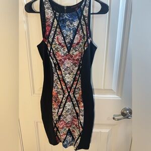 Black fitted dress with lace detail